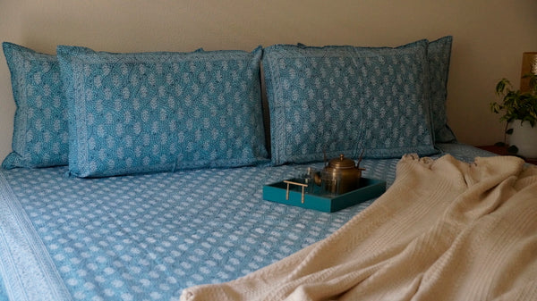 Foundation Edit Polki Print hand-block printed South Cotton bedsheet set by DewDropHues, featuring a jewelry-inspired geometric design and breathable heritage weave.