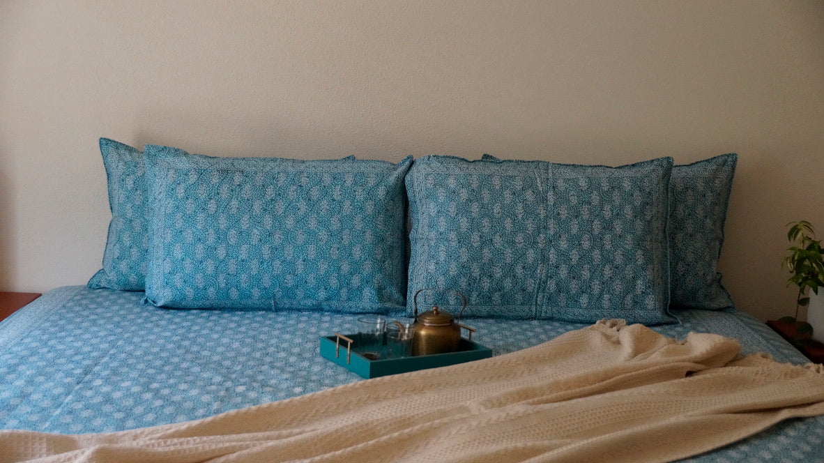 Foundation Edit Polki Print hand-block printed South Cotton bedsheet set by DewDropHues, featuring a jewelry-inspired geometric design and breathable heritage weave.