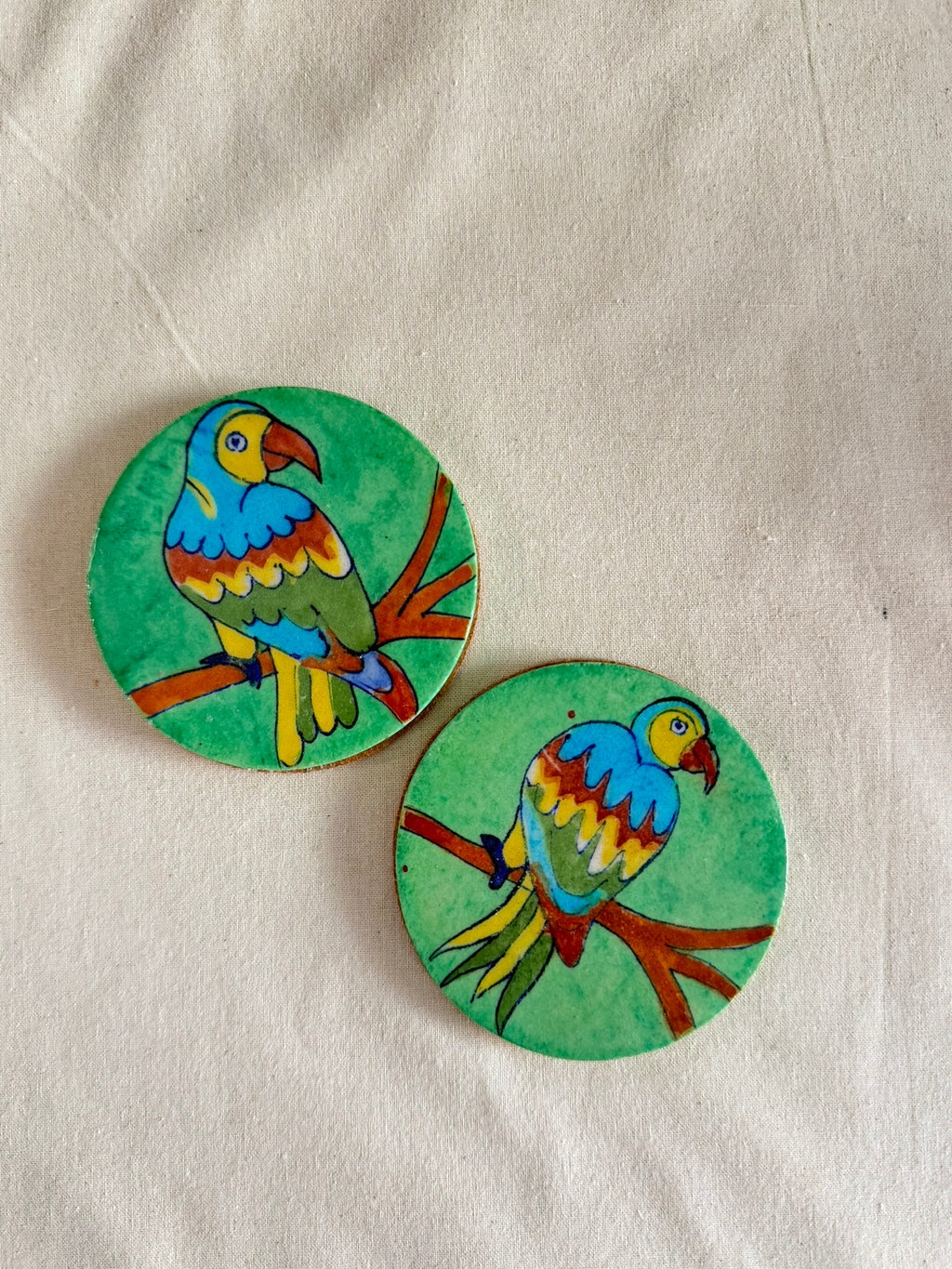 Perky Parrot - Blue Pottery Coaster Pair
