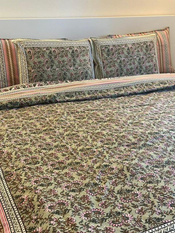 Foundation Edit Floral Kaleidoscope hand-block printed South Cotton bedsheet set by DewDropHues, featuring a vibrant botanical design and breathable heritage weave.