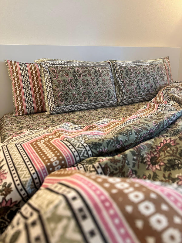 Foundation Edit Floral Kaleidoscope hand-block printed South Cotton bedsheet set by DewDropHues, featuring a vibrant botanical design and breathable heritage weave.