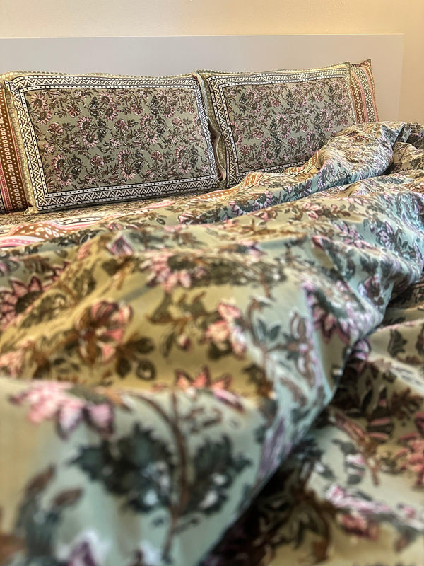 Foundation Edit Floral Kaleidoscope hand-block printed South Cotton bedsheet set by DewDropHues, featuring a vibrant botanical design and breathable heritage weave.