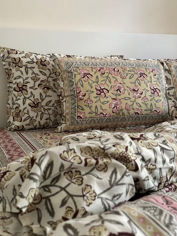 Foundation Edit Olive Blush hand-block printed South Cotton bedsheet set by DewDropHues, featuring a subtle floral design and breathable heritage weave.