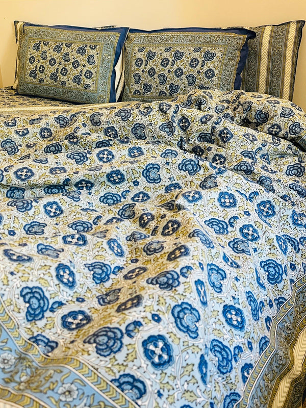 Foundation Edit Floral Kaleidoscope hand-block printed South Cotton bedsheet set by DewDropHues, featuring a vibrant botanical design and breathable heritage weave.