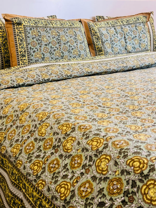 Foundation Edit Floral Kaleidoscope hand-block printed South Cotton bedsheet set by DewDropHues, featuring a vibrant botanical design and breathable heritage weave.