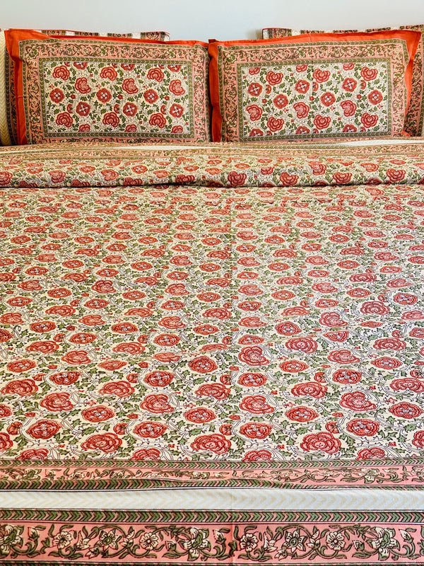 Foundation Edit Floral Kaleidoscope hand-block printed South Cotton bedsheet set by DewDropHues, featuring a vibrant botanical design and breathable heritage weave.
