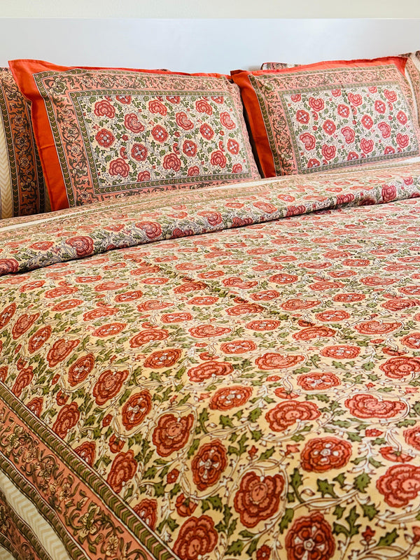 Foundation Edit Floral Kaleidoscope hand-block printed South Cotton bedsheet set by DewDropHues, featuring a vibrant botanical design and breathable heritage weave.