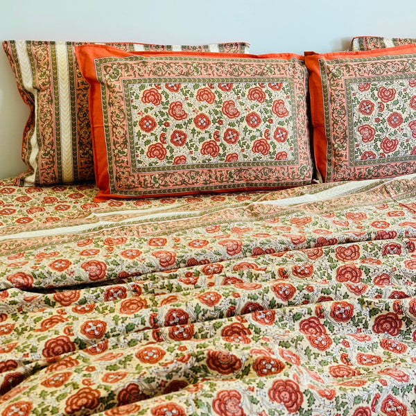 Foundation Edit Floral Kaleidoscope hand-block printed South Cotton bedsheet set by DewDropHues, featuring a vibrant botanical design and breathable heritage weave.