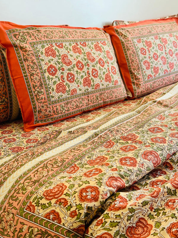 Foundation Edit Floral Kaleidoscope hand-block printed South Cotton bedsheet set by DewDropHues, featuring a vibrant botanical design and breathable heritage weave.