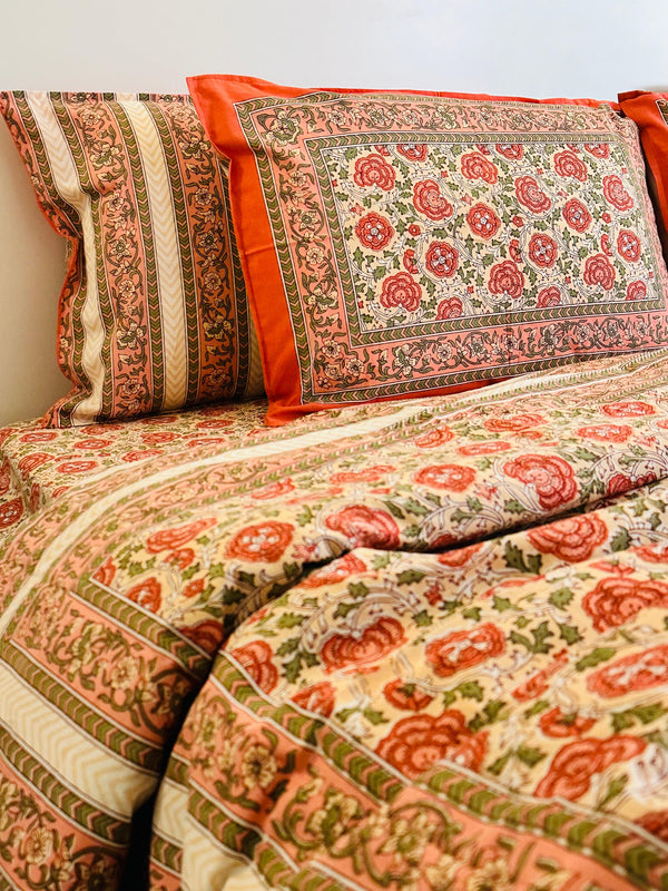 Foundation Edit Floral Kaleidoscope hand-block printed South Cotton bedsheet set by DewDropHues, featuring a vibrant botanical design and breathable heritage weave.