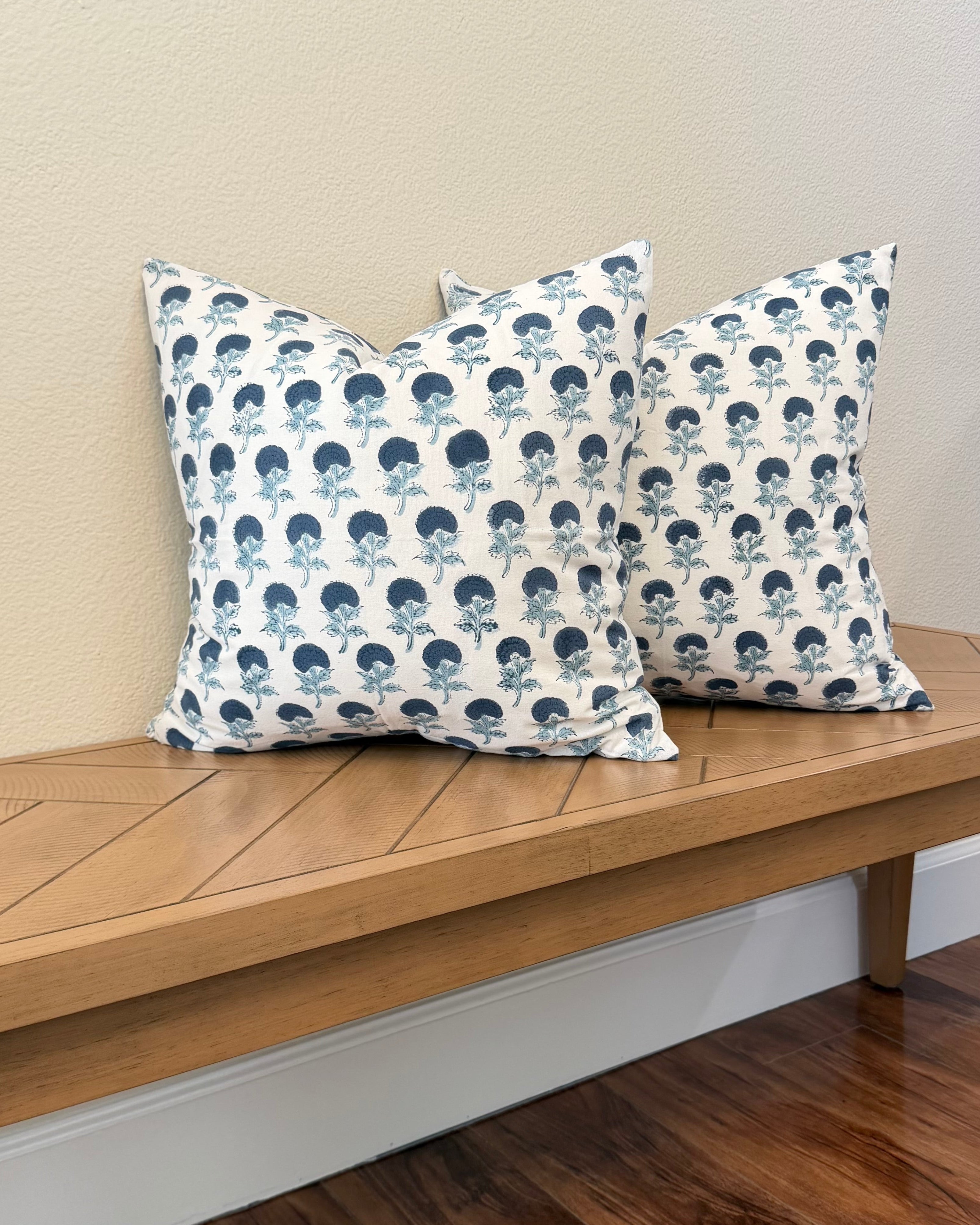 Hand Block printed throw pillow with small floral motifs in Indigo Blue on White.