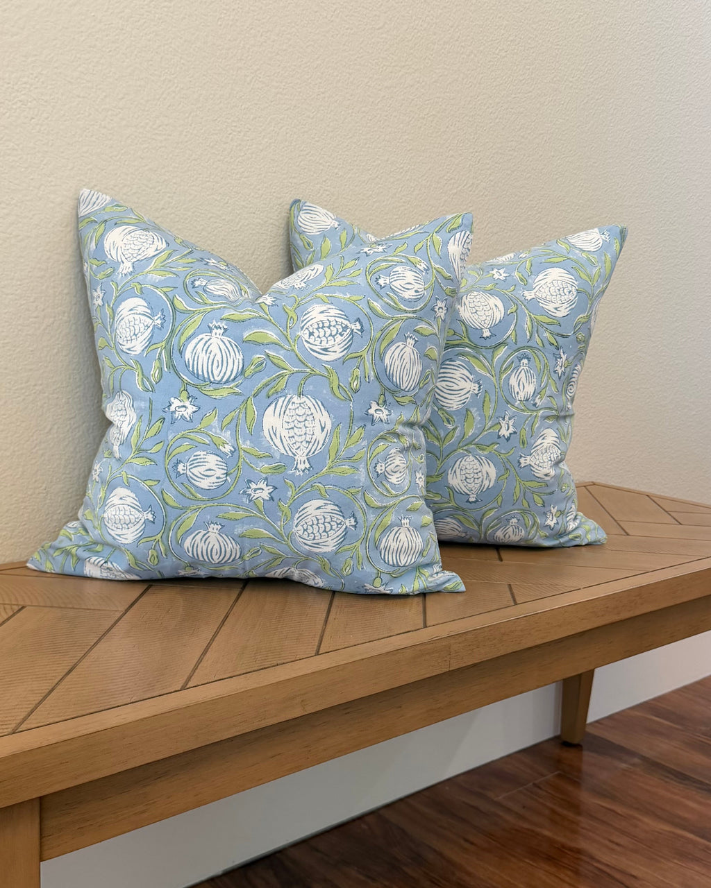 Hand Block printed throw pillow with Pomegrate vine motif in muted blues and greens.