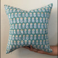 Hand Block printed throw pillow with pineapple motifs in muted blues and ochre.
