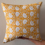 Hand Block printed throw pillow with floral vine motifs in bright ochre yellow and gray.