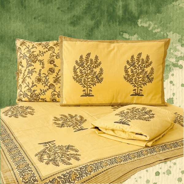 Foundation Edit Parrot Perch hand-block printed South Cotton bedsheet set by DewDropHues, featuring an intricate tree and parrot motif and breathable heritage weave.