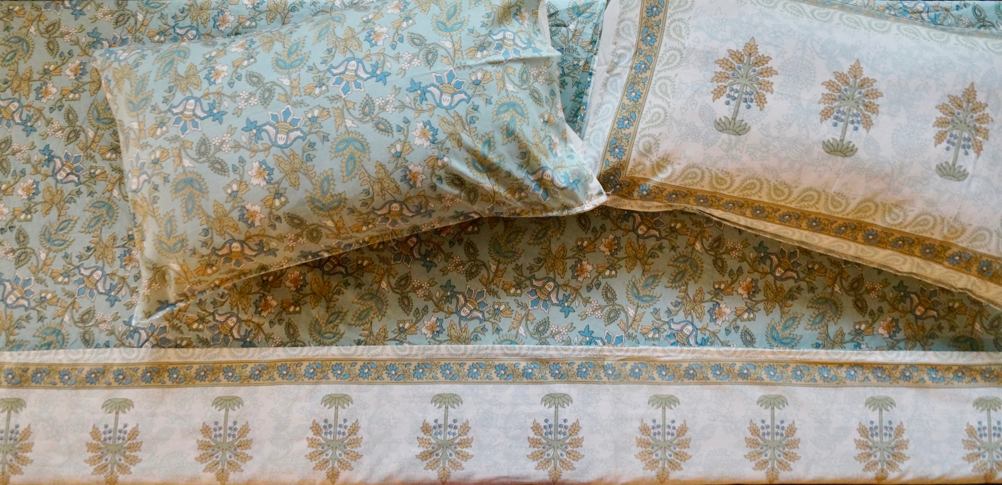 Foundation Edit Blue Meadows hand-block printed South Cotton bedsheet set by DewDropHues, featuring an intricate floral design and breathable heritage weave.