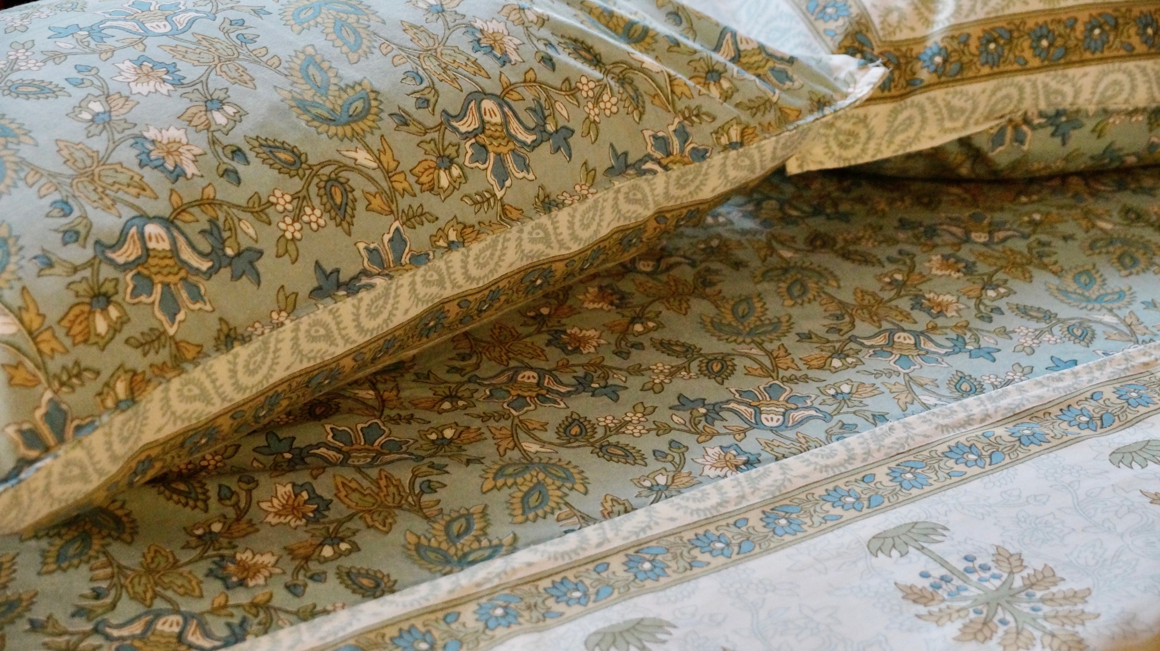 Foundation Edit Blue Meadows hand-block printed South Cotton bedsheet set by DewDropHues, featuring an intricate floral design and breathable heritage weave.