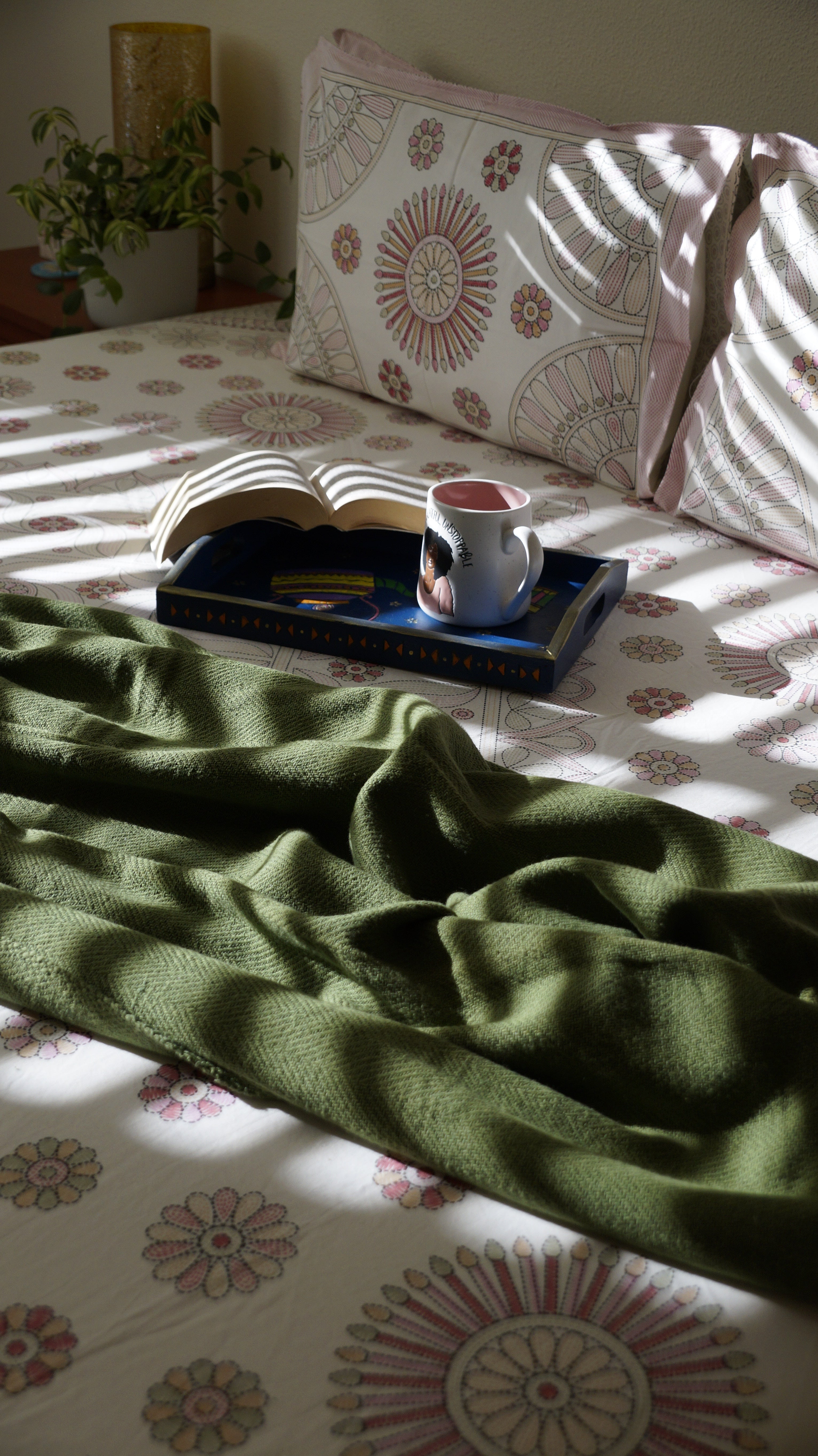 Circle Medley hand-block printed floral pattern on breathable South Cotton bedding.