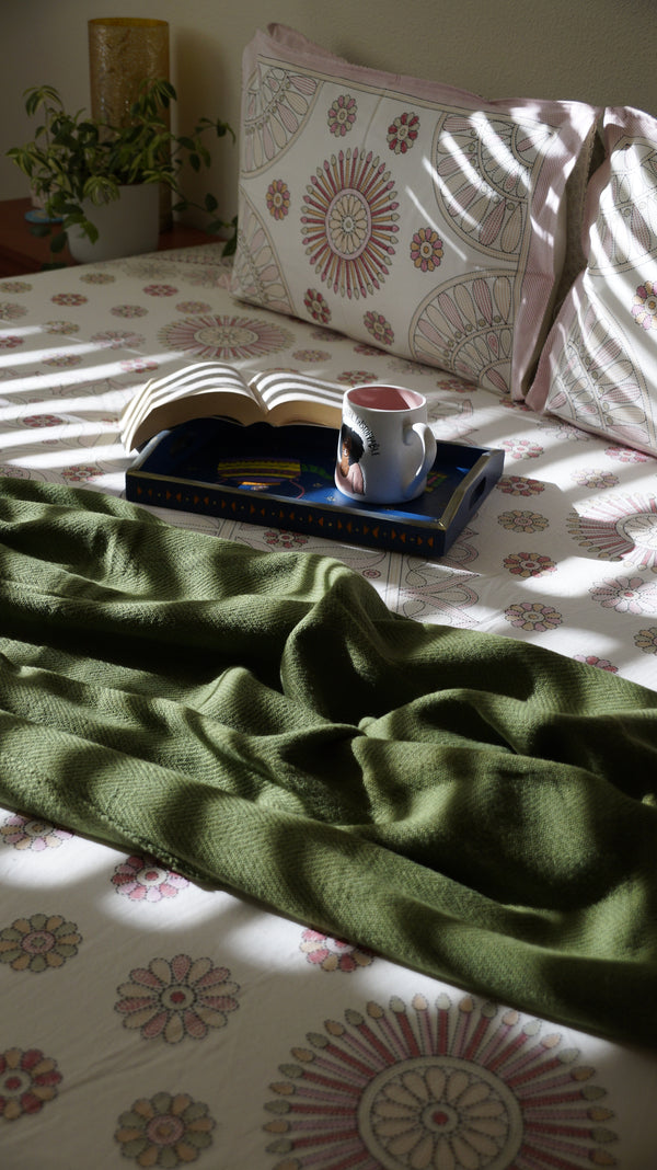 Circle Medley hand-block printed floral pattern on breathable South Cotton bedding.
