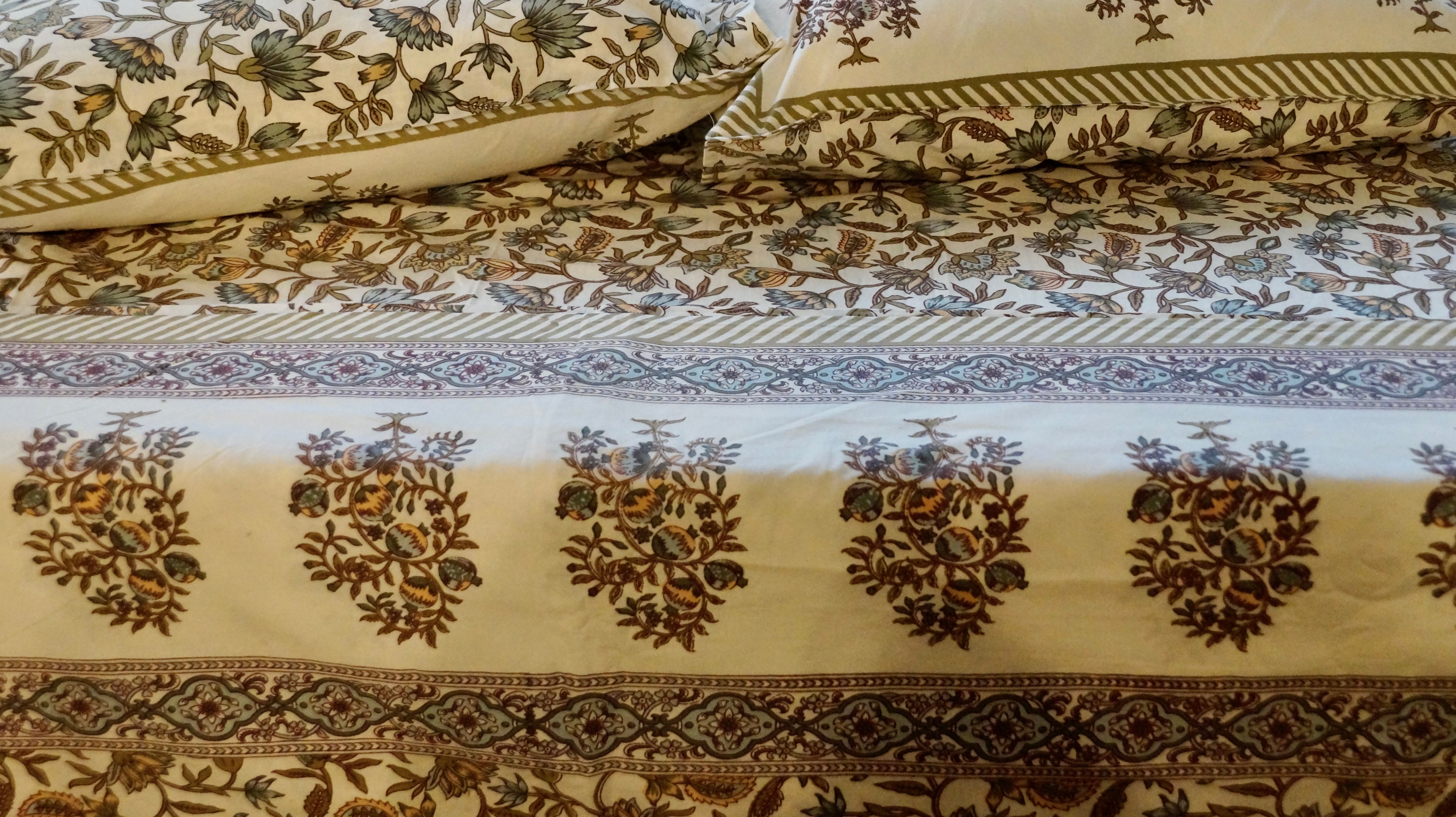 Foundation Edit Garden Glow hand-block printed South Cotton bedsheet set by DewDropHues, featuring a natural botanical design and breathable artisanal weave.