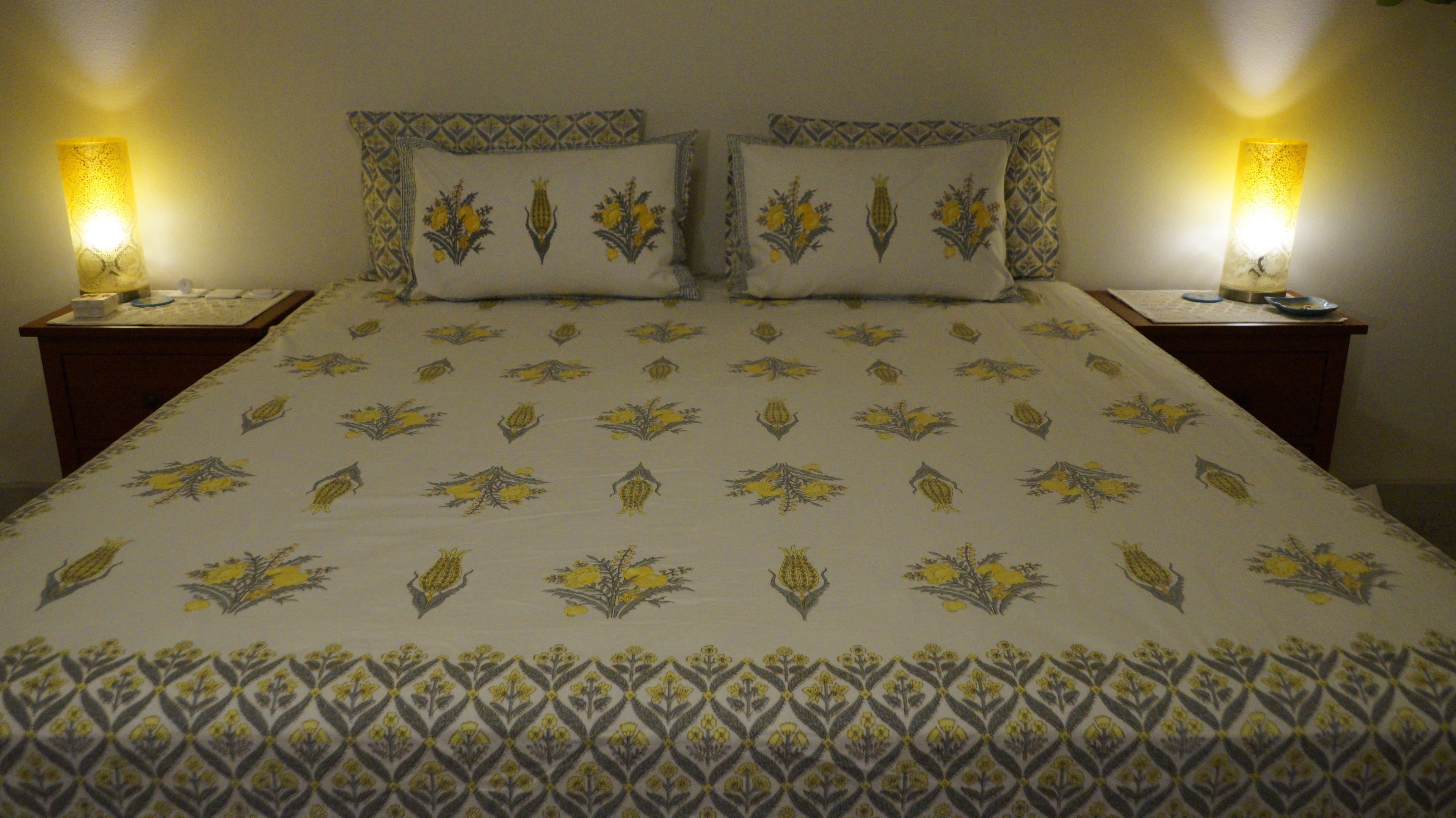 Foundation Edit Zesty Bliss hand-block printed South Cotton bedsheet set by DewDropHues, featuring a lemon motif design and premium yellow lattice border.